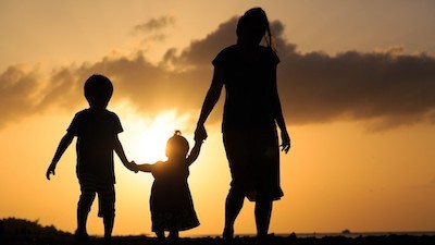 Family at sunset, child tax credit