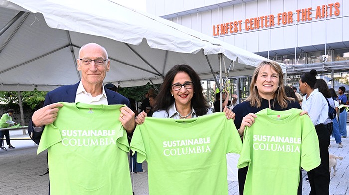 From left: Teachers College President Thomas Bailey, Columbia President Minouche Shafik, and Barnard President Laura Rosenbury hold up "Sustainable Columbia" T-shirts