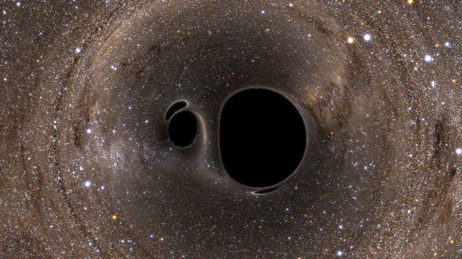 A computer rendering of two black holes that are about to merge, as viewed from above. (Credit: SXS Lensing/Simulating eXtreme Spacetimes Collaboration)