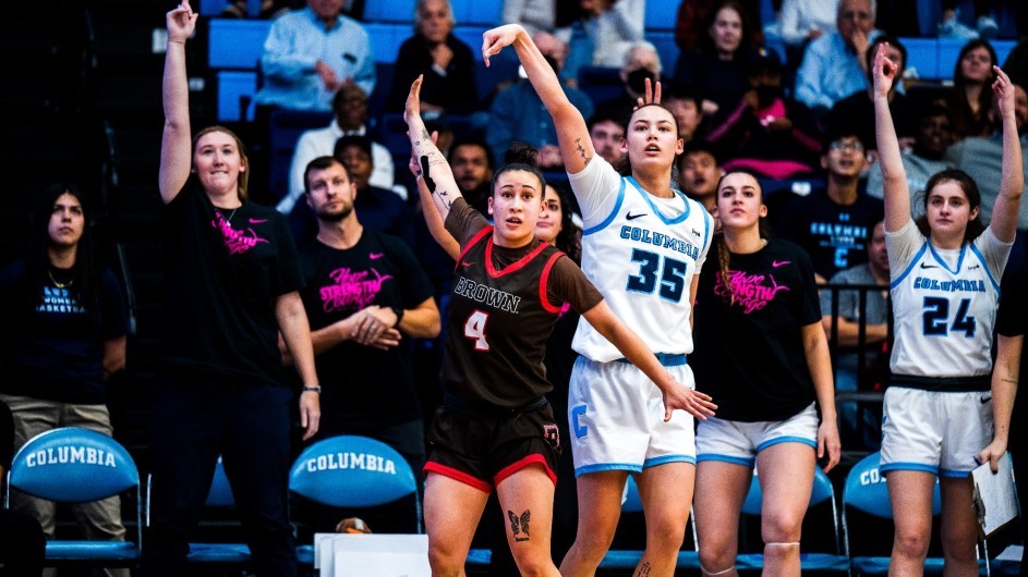Columbia Women's basketball player Abbey Hsu follows through on a jump shot against Brown.