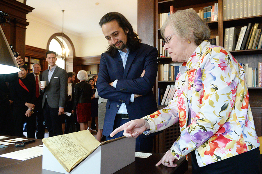 Lin Manuel Miranda reviewing rare documents at Columbia University