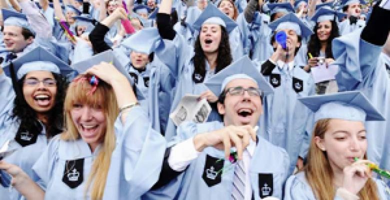 Graduates cheering in blue