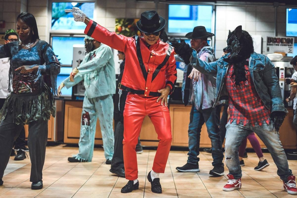A group of people imitate characters from the music video Thriller, by Michael Jackson