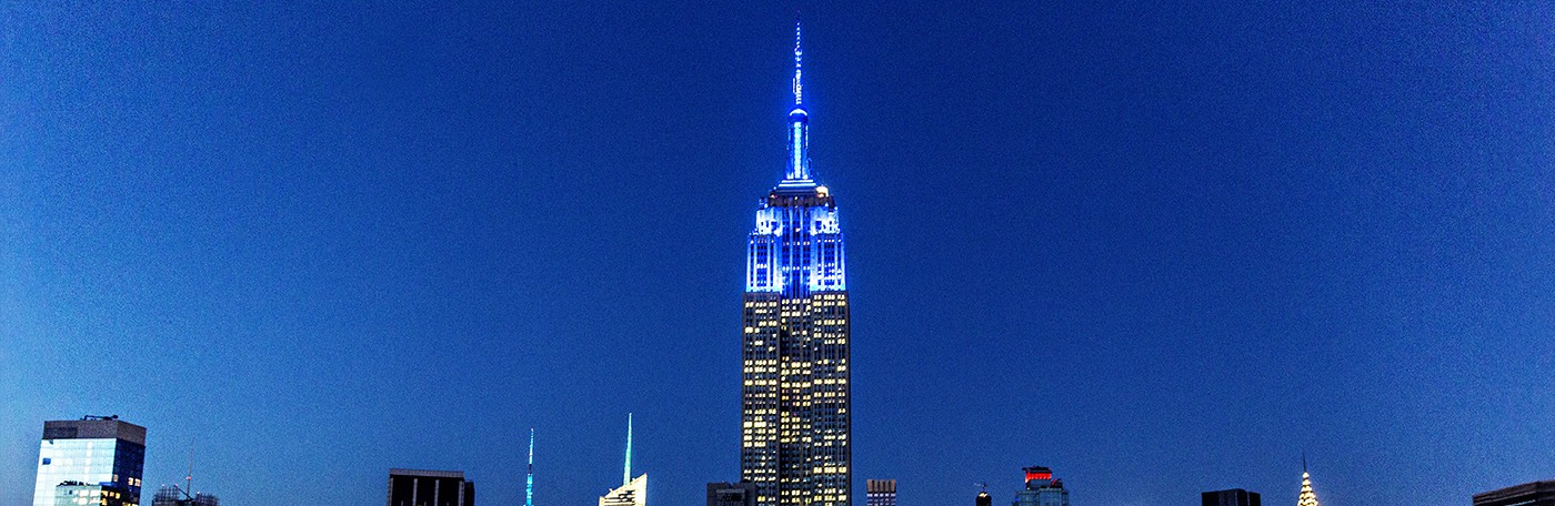 empire state building glowing blue