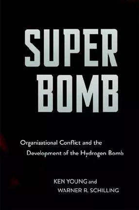 A black book cover with white letters that say Super Bomb.