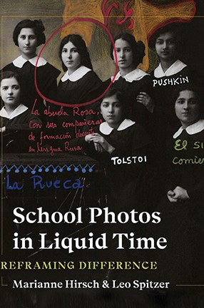 A book cover with a photo of girls in black and white uniforms. Title: School Photos in Liquid Time--Reframing Difference. 