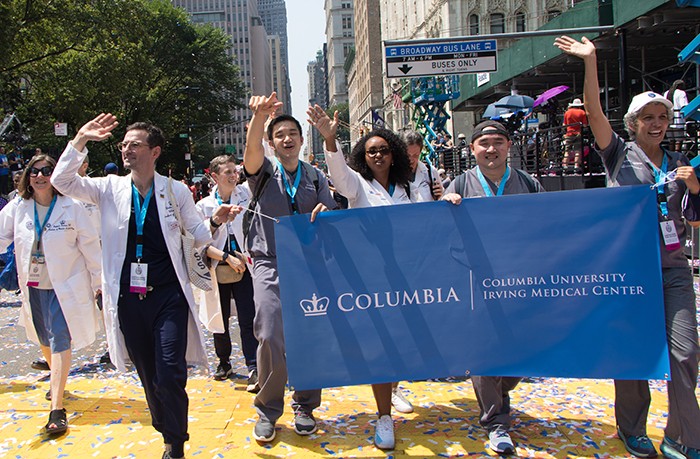 Columbia doctors and nurses walk in the 2021 Ticker Tape parade for Hometown Heroes.