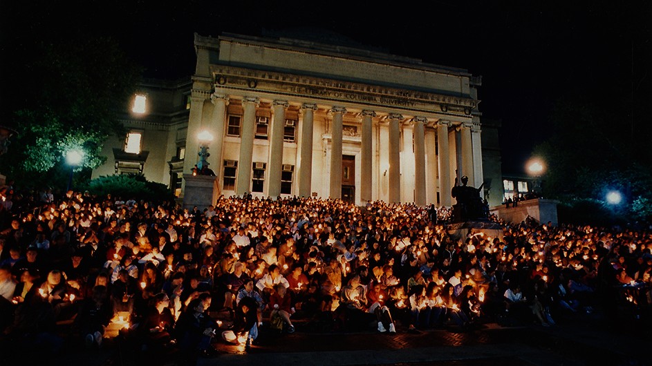 A vigil on Low Library steps a year after 9/11/2001. Photo by Eileen Barroso.