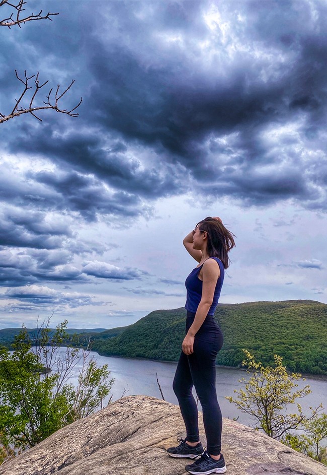 Ying Li looks out from Breakneck Ridge. 