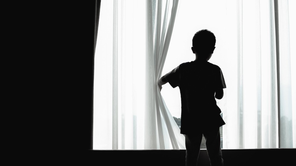 Children in New York City, whether they lived close to the World Trade Center or not, experienced distress after September 11. Child looking out a window