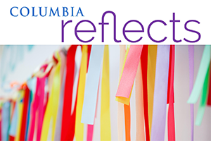 Colorful ribbons with the words Columbia reflects.