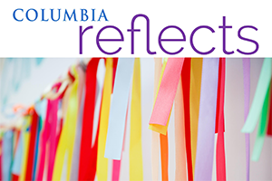 Colorful ribbons with the words Columbia reflects. 