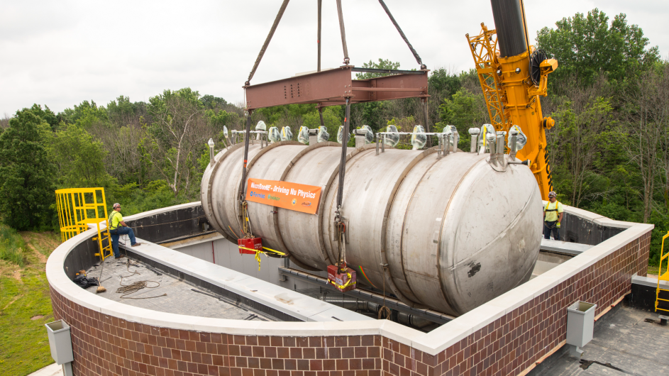 MicroBooNE detector being lowered into facility at Fermilab.