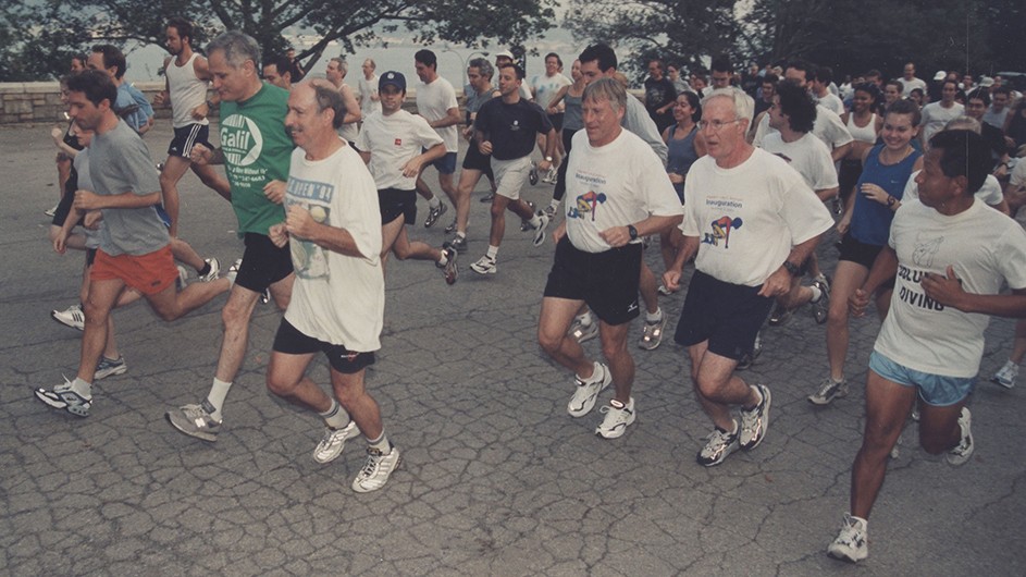 President Bollinger and students at the starting line of the 2002 Fun Run. 
