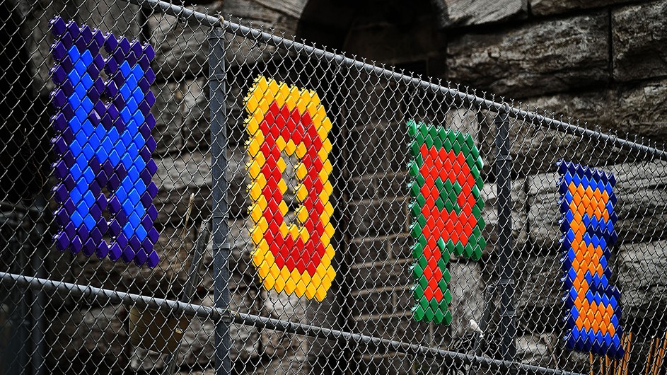 A sign in Harlem reading "HOPE" in colorful letters. 