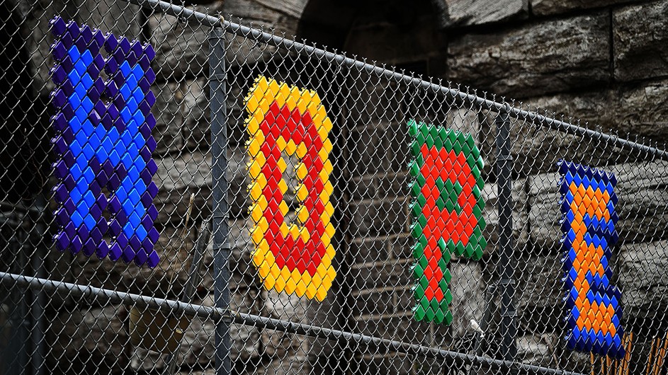 Photo by Eileen Barroso A sign in Harlem reading "HOPE" in colorful letters.