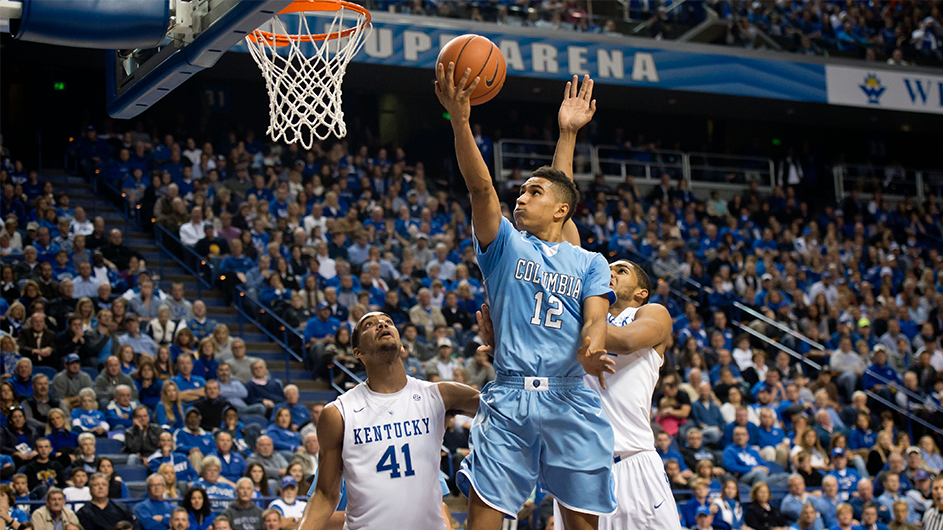 Maodo Lo makes a basket.