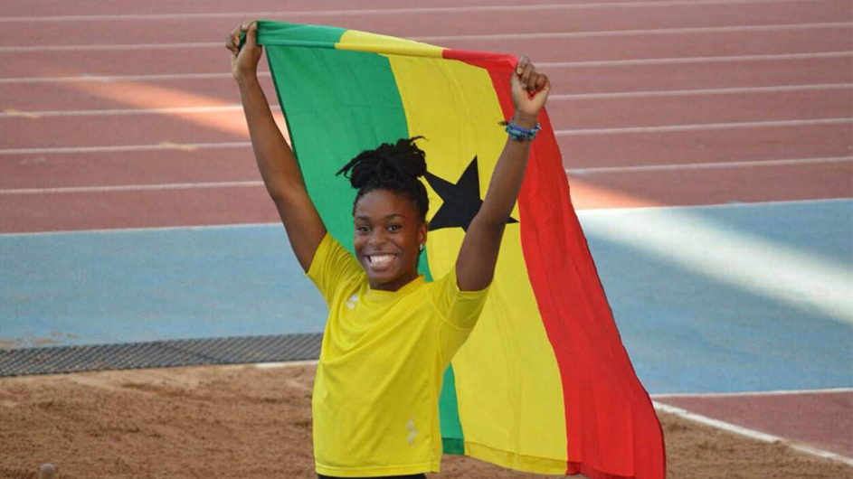 Nadia Eke bearing the Ghanian flag at the All-African Games in 2015. Photo Courtesy Columbia Athletics. Nadia Eke bearing the Ghanian flag at the All-African Games in 2015.