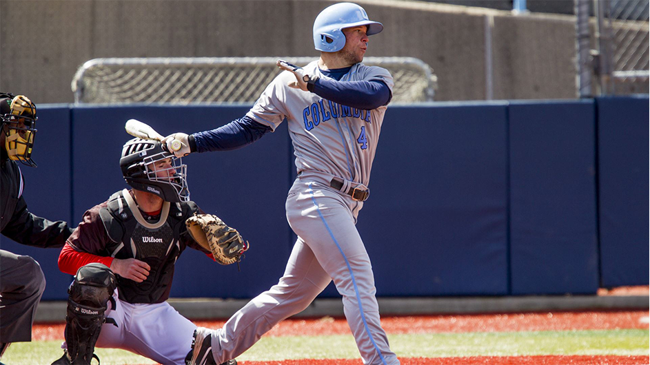 Rob Paller. Courtesy Columbia University Athletics. Rob Paller swinging a baseball bat.