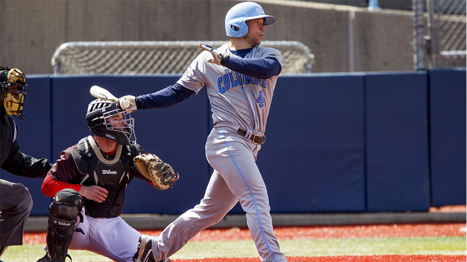 Rob Paller swinging a baseball bat.