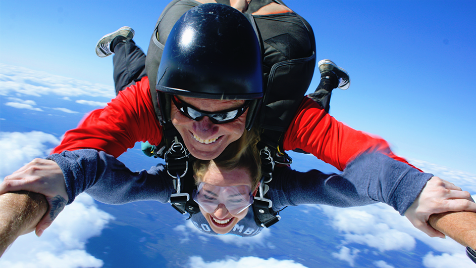 Stephanie Main skydiving in a Columbia sweatshirt. 