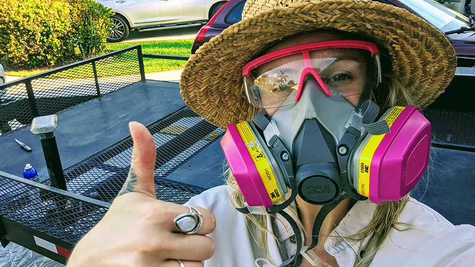 Stephanie Main in protective equipment and a hat