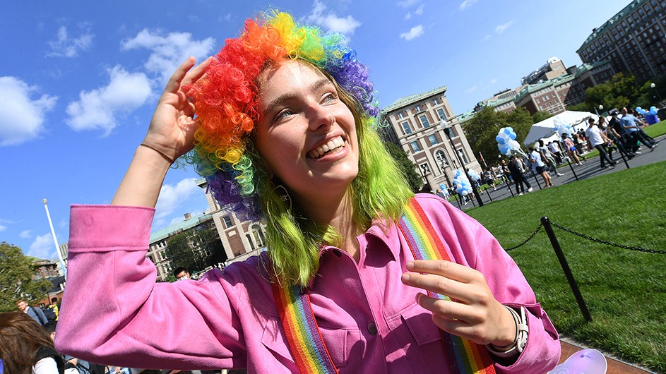 Venice Ohleyer in a clown wig and suspenders. 