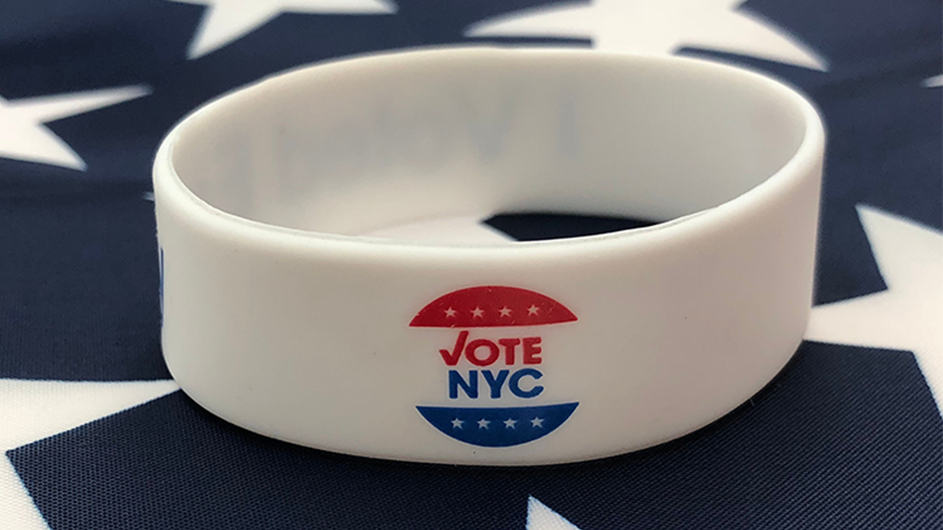 A Vote NYC wristband. 
