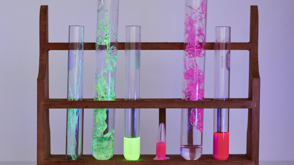 Werewool, a startup that sprung from a lab at Columbia Engineering, makes biodegradable fibers that fluoresce without toxic dyes. (Photo: Jon Brown) test tubes with biodegradable, naturally fluorescent fibers made with engineered proteins
