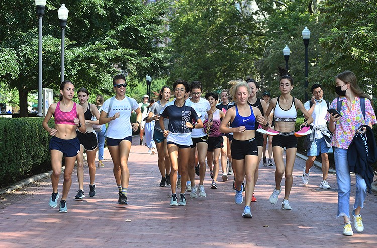 Cross Country runners run on Columbia's Campus