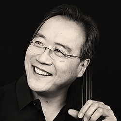 Yo-Yo Ma in black and white, a man in glasses holding a cello