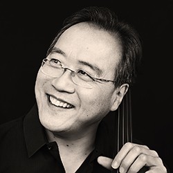 Yo-Yo Ma. Photo: Jason Bell. Yo-Yo Ma in black and white, a man in glasses holding a cello