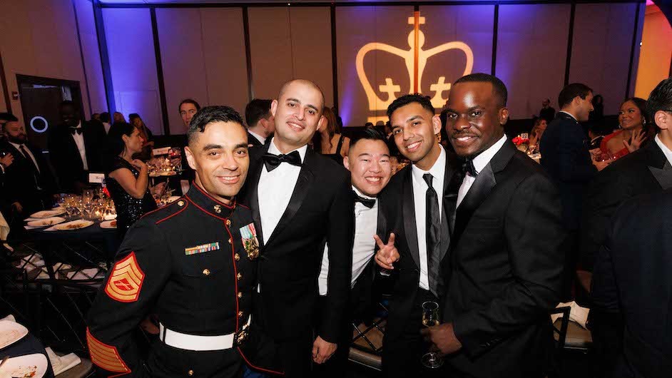 Five men dressed in uniform or black tie at the annual Military Ball hosted by Columbia’s School of General Studies.