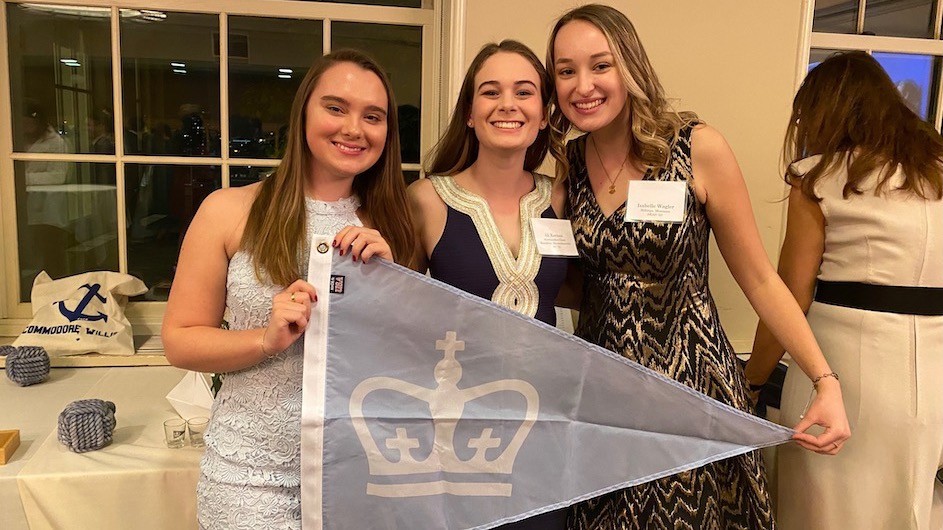 Alison Keenan, center, with friends from the sailing team. Alison Keenan, center, with friends from the sailing team