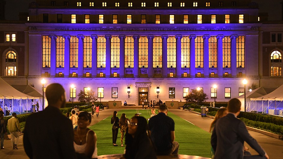 Butler Library lit blue for Alumni Weekend 2022, Columbia University