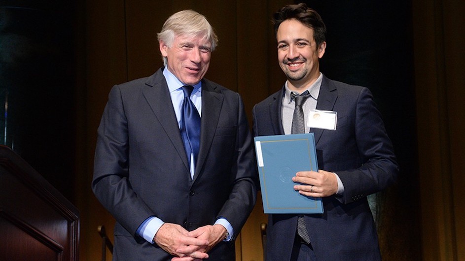 Columbia University President Lee C. Bollinger presents the 2016 Drama Prize to Lin-Manuel Miranda. Photo credit: Eileen Barroso President Lee C. Bollinger and Lin Manuel Miranda