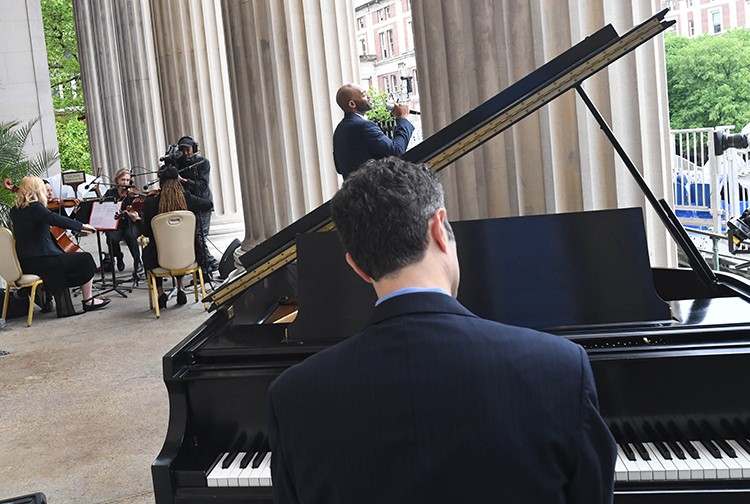 Award-winning composer, conductor, orchestrator, and musician Tom Kitt (CC'96) and actor, singer, and theatrical producer Brandon Victor Dixon (CC'07) performed Columbia's newest song, "Oh, Columbia" at the Celebration for the Classes of 2020 and 2021. Photo by Eileen Barroso. Tom Kitt and Brandon Victor Dixon perform 'Oh Columbia.'