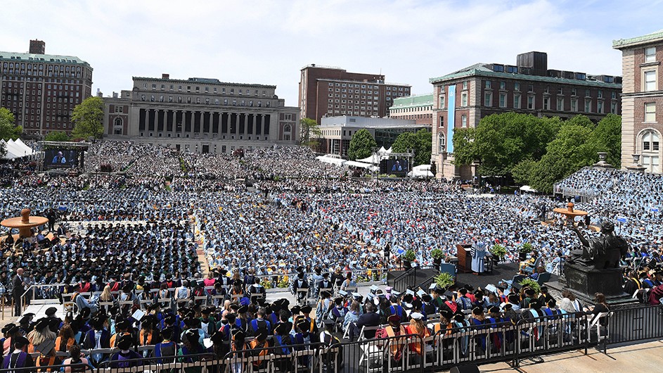 A view of the crowd stretching from Low Library to Butler Library on Commencement Day. 