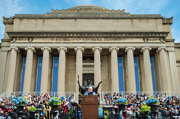 University President Lee C. Bollinger addresses the Class of 2022 in his Commencement Address on May 18, 2022. Photo by Diane Bondareff. University President Lee C. Bollinger delivers his commencement address in front of Low Library.