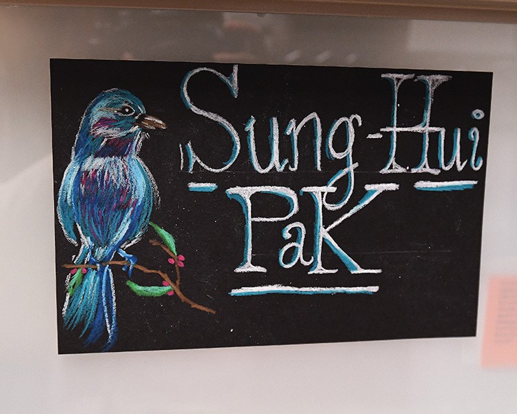 Freddy's blue bird art for Sung-Hui Pak. Photo by Eileen Barroso. Freddy Claudio's art showing a blue bird for Sung-Hui Pak.