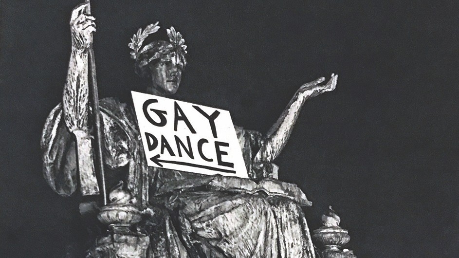 Alma Mater statue with a sign "Gay Dance" on Columbia University's Morningside campus