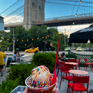 Ice cream in front of the Brooklyn Bridge. 
