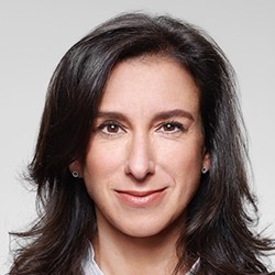 Jodi Kantor, a woman with long, dark hair. 