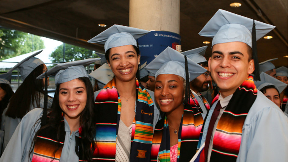 Four Columbia graduates at a Multicultural Ceremony. 