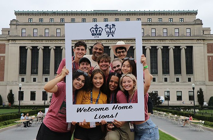Columbia undergraduate students pose in front of Butler Library during the New Student Orientation program.