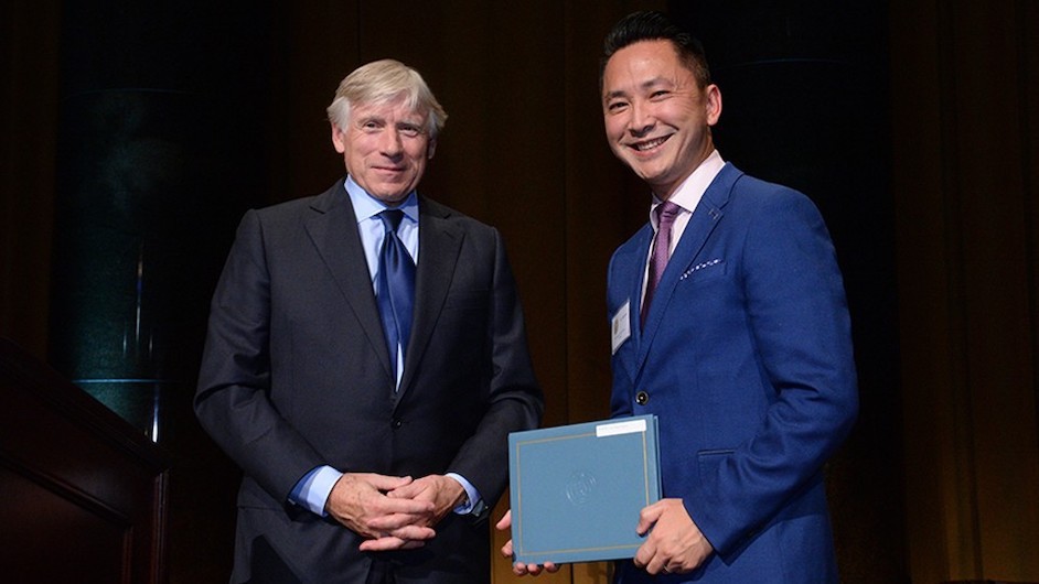 Columbia University President Lee C. Bollinger presents the 2016 Fiction Prize to Viet Thanh Nguyen. Photo credit: Eileen Barroso President Lee C. Bollinger and Viet Nguyen