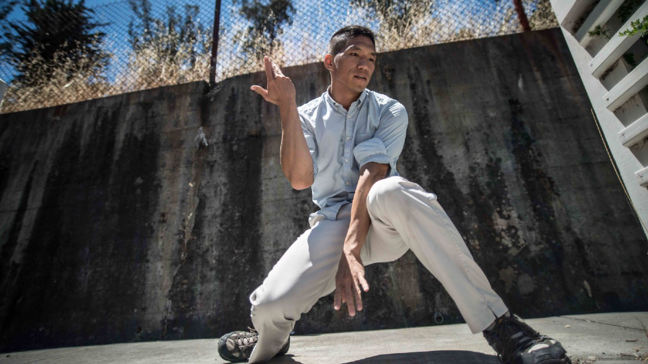 In "Within These Walls," Wayne T. Lee and members of Lenora Lee Dance put on an improv dance performance on Angel Island in San Francisco Bay, where waves of Chinese immigrants first landed in the United States. Photo: Robbie Sweeny Wayne T. Lee performs in "Within These Walls" by Lenora Lee Dance. (Photo: Robbie Sweeny)