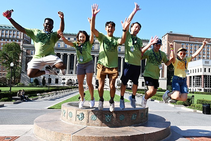 Student leaders jump off of the Sundial during NSOP.