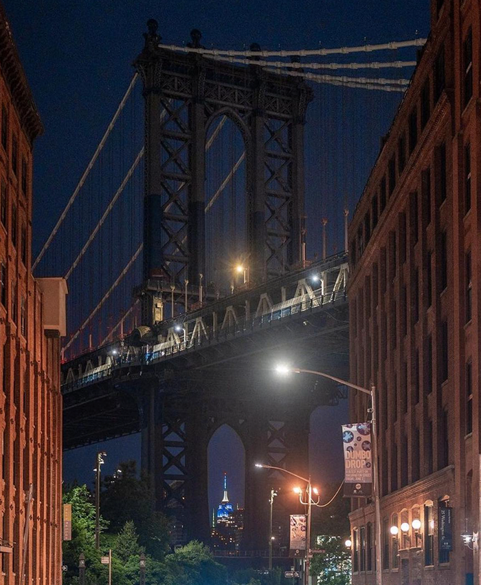 Photo by Xi Zhao (SEAS’23). The Empire State Building image ® is a registered trademark of ESRT Empire State Building, L.L.C. and is used with permission. A view of the Empire State Building through the Manhattan Bridge.