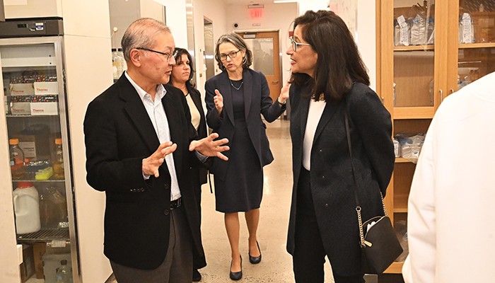 Dr. David Ho and Minouche Shafik at Columbia Medical Center.